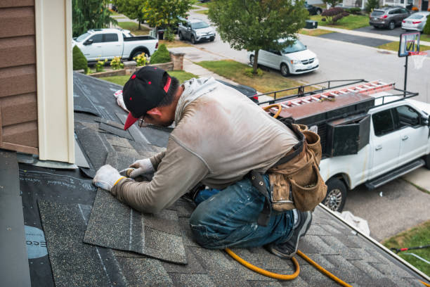 Professional Roofing technician working in Greene, ME